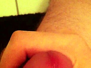 Detailed scene of a guy wanking in the toilet