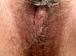 Horny brunette feels orgasm from bottle masturbation