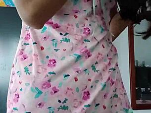 Beautiful latina model poses in pink pajamas