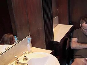 The milf slut in red stockings feels intense pleasure during doggy style fucking.