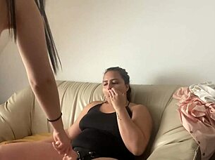 lesbian strapon play on the sofa