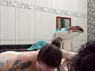 brunette gives blowjob in bath, swallows cum from monster cock