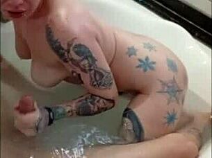 brunette gives blowjob in bath, swallows cum from monster cock