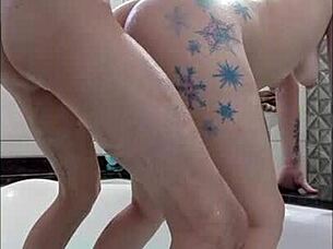 brunette gives blowjob in bath, swallows cum from monster cock