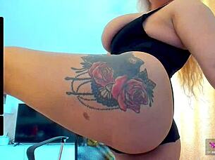 Blonde and beautiful webcam model with big boobs in action