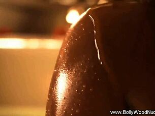 Her beautiful asian body contrasts with the exotic nude lover's sensual touch.