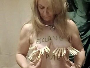 french slave performs solo session with chains and clamps