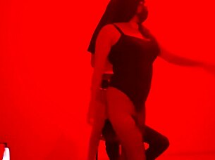 a scruffy man invites us to an exclusive catwalk to perform a dance in lingerie