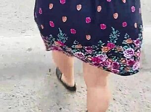 I follow and lift her skirt in the street, flashing her huge blonde ass 😏