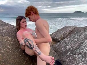 Brazilian Exhibitionist with Tattoo Fucked on Beach Behind Rocks