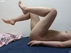 naked japanese girl gropes her tits while stretching in her room on webcam