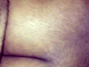 A woman rides a large cock in cowgirl position