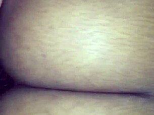 A woman rides a large cock in cowgirl position