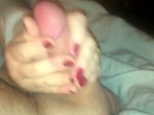 Wife gives emotional handjob to husband's monster cock.