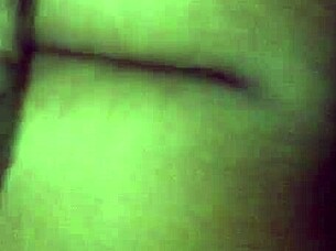 A woman rides a large cock in cowgirl position