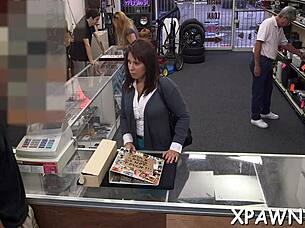 Couple engages in sloppy cock sucking in shop.