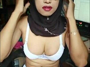 the black hijab transgirl slut masturbates her cock until she cums