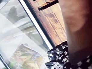 spying upskirt under skirt in store