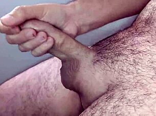 Masturbating on a small chair in bedroom.