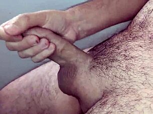 Masturbating on a small chair in bedroom.