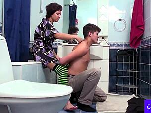 Alla and Navon share intimate dorm massage.