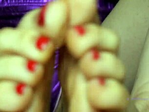 Small feet mistress with red polish dominates sensually