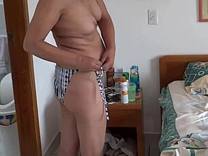 on the beach, my stepson films me in bikini, fascinated by his bulge