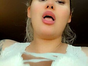 Intriguing closeup of big natural tits on blonde beauty.