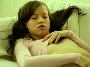 lynn strips naked and rams glass dildo deep in dripping cunt