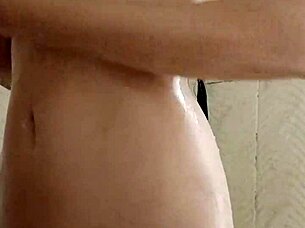 college girl masturbates in shower, gets caught.