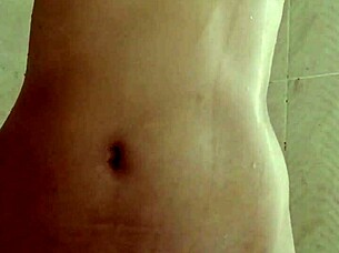 college girl masturbates in shower, gets caught.