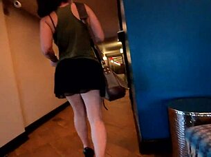 Milf stages skirt malfunction to show her big ass in public