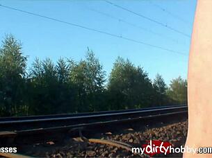 Short-haired amateur blonde swallows cum outdoors.