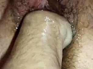 fat hairy pussy gets fisted closeup squirting hard