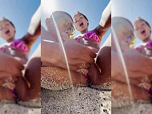 Watch this sexy latina get fingered on the beach?