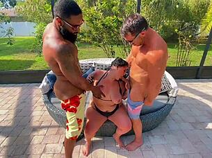 Hotwife Enjoys Poolside Threesome with Muscular Men