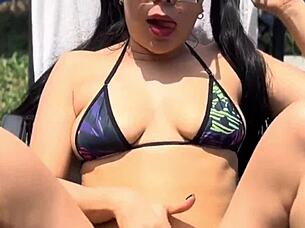 Young slut masturbates pussy and tits in public pool