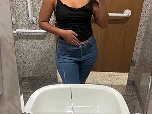 watch her masturbate in the mall bathroom until she squirts