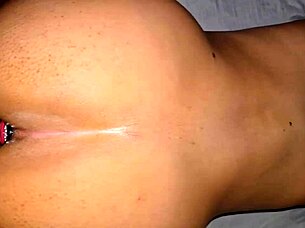 couple enjoys doggystyle with plug in anal play