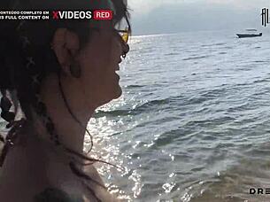 She says 'show me your tits on the beach' then 'let's fuck on the rocks'