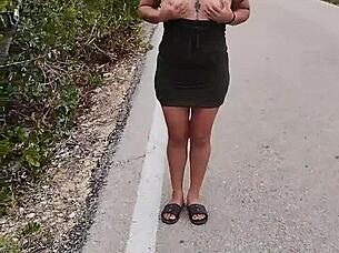 Slut exposes tits and ass on mexican public road