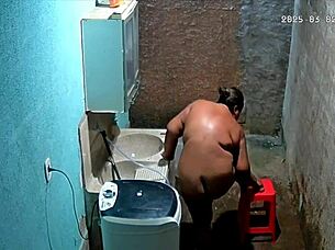 brazilian milf stepmother feels embarrassed shaving her huge big natural tits while stepson secretly watches on hidden camera