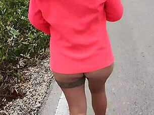 Slut exposes tits and ass on mexican public road