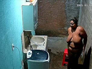 brazilian milf stepmother feels embarrassed shaving her huge big natural tits while stepson secretly watches on hidden camera