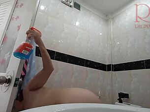 Naked maid cleans without panties