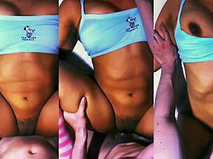 The student undresses before the muscular man in the apartment room.