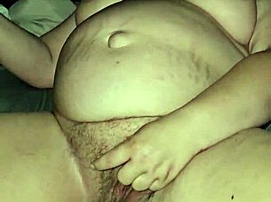 Pregnant milf spreads her pussy for some camp sex fun