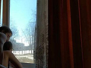 Helga Bosk has risky sex by the window with people walking by