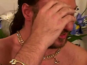 lucky guy gets shared by two busty blonde bimbos in a threesome