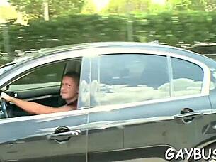 Enjoying oral stimulation with a handsome gay hunk in a passionate encounter.